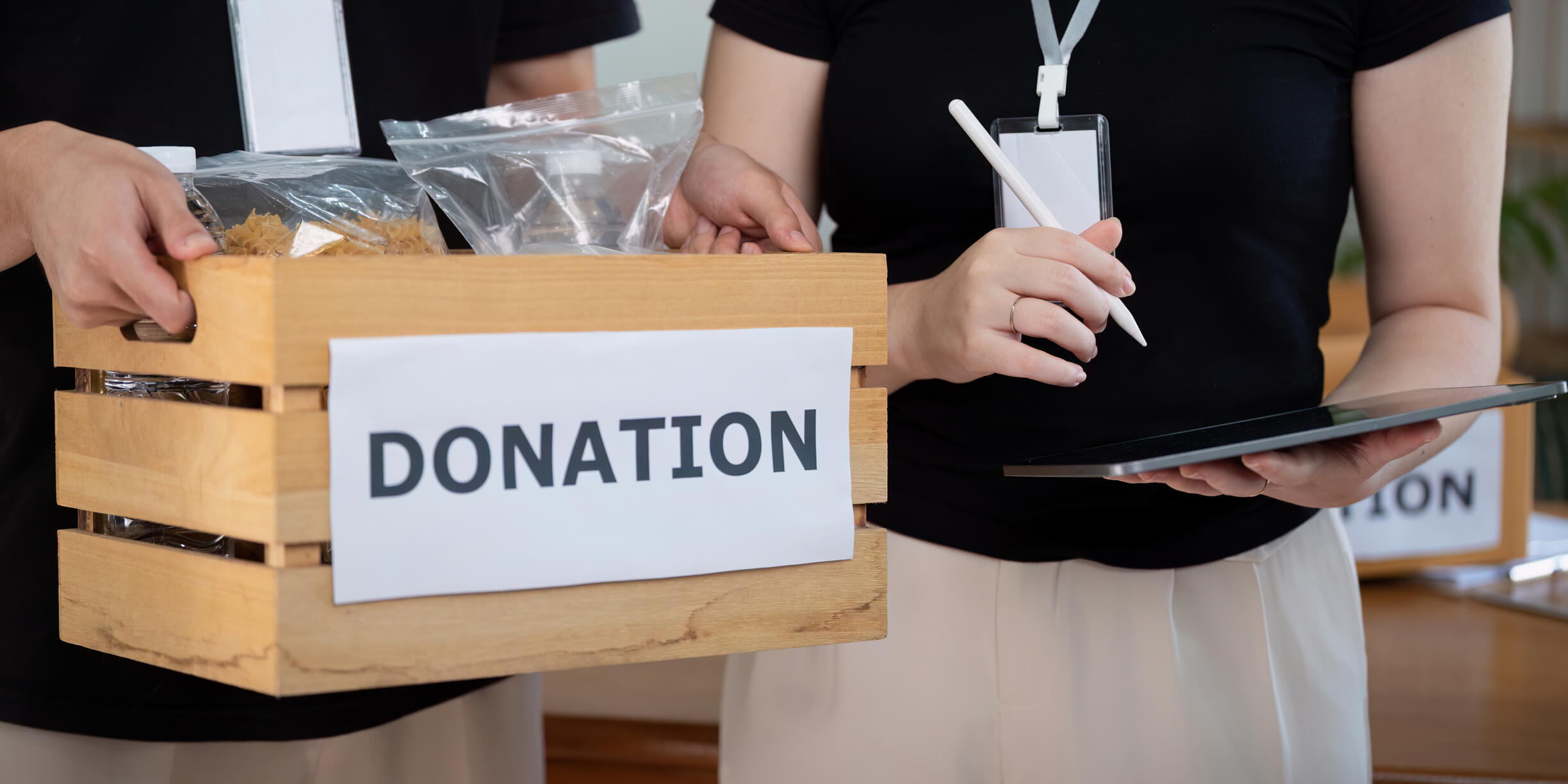 Donation box and clipboard