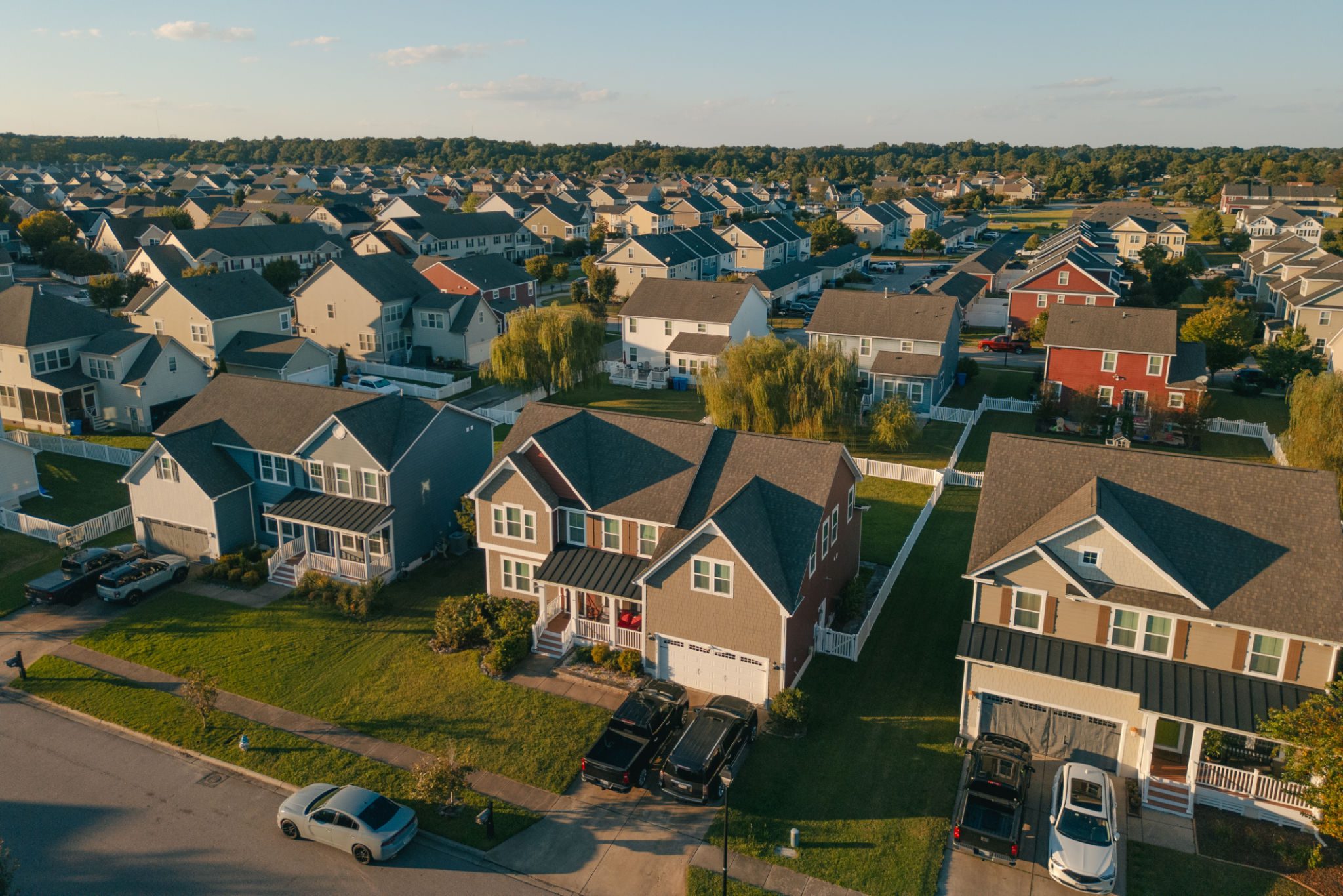 Houses with green lawns in suburbia
