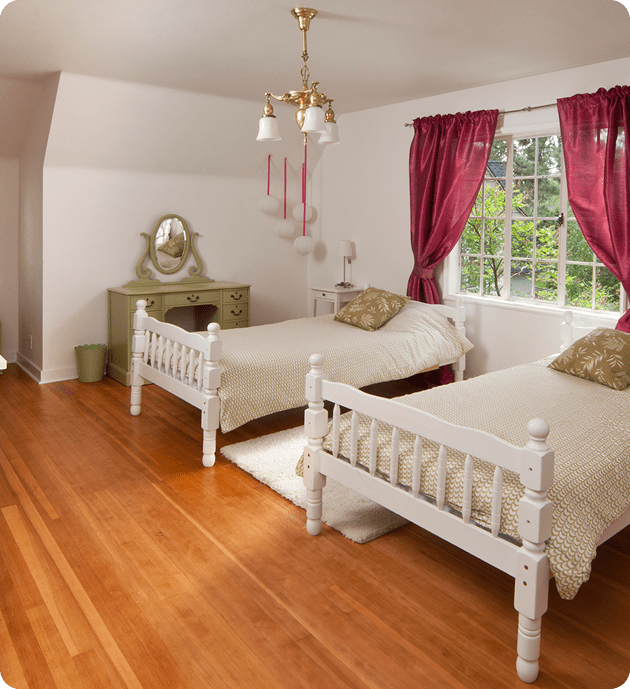 Elegant bedroom with red curtains